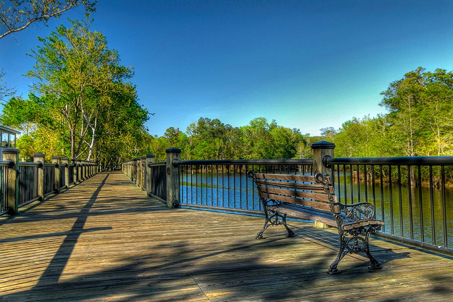 A peaceful shot of Conway's Riverwalk.
